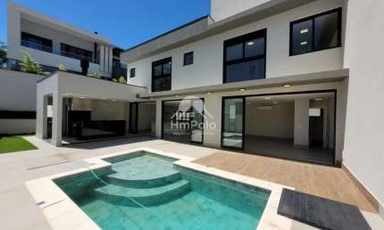 Casa com 4 suítes 6 banheiros e 4 vagas a venda no Alphaville Dom Pedro em Campinas/SP