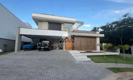 Casa à venda com 3 suítes, escritório, área gourmet, 4 vagas no Swiss Park em Campinas/SP.