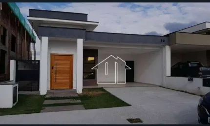 Casa com 3 dormitórios à venda, 158 m² por R$ 1.100.000,00 - Condomínio Malibu - Caçapava/SP