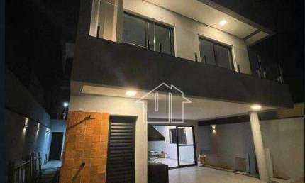 Casa com 3 dormitórios à venda, 220 m² por R$ 1.300.000,00 - Condomínio Malibu - Caçapava/SP