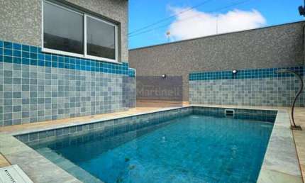 Casa à venda em Itanhaém-SP, Cibratel II: 3 quartos, 1 suíte, 3 banheiros, 126m² de área!