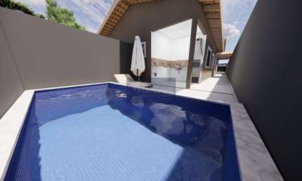 Casa à venda em Suarão, Itanhaém-SP: 2 quartos, 1 suíte, 2 salas, 1 vaga, 63,83m² de área. Confira!