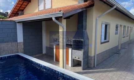 Imperdível Casa à Venda em Nova Itanhaém-SP: 2 Quartos, 1 Suíte, 2 Salas, 2 Vagas de Garagem, 65m² de Área!