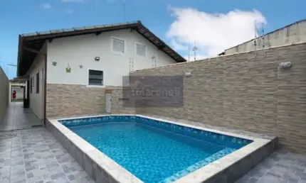 Casa à venda em Itanhaém-SP, bairro Jamaica: 2 quartos, 1 suíte, 3 banheiros, 2 vagas, 61m² de área! Venha conhecer!