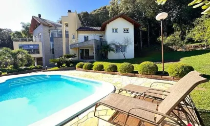 Casa em Condominio para Venda - 583m², 4 dormitórios, sendo 3 suites, 4 vagas - Linha 40