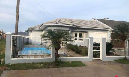 Casa com 3 quartos à venda na Avenida Taquara, 215, Centro, Arroio do Sal por R$ 780.000