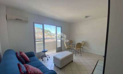 LIADO COM 3 QUARTOS, VAGA DE GARAGEM E VISTA PANORÂMICA NO CENTRO DE FLORIANÓPOLIS