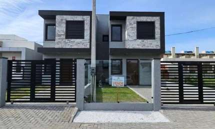 Casa 04 Dorm à venda no Bairro CAPÃO NOVO - 2 vagas de garagem