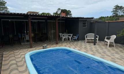 Casa 02 Dorm à venda no Bairro CAPÃO NOVO - 2 vagas de garagem