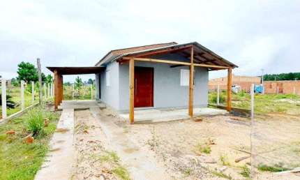 Casa 02 Dorm à venda no Bairro CAPÃO NOVO - 1 vaga de garagem
