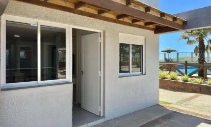 Casa 02 Dorm à venda no Bairro CAPÃO NOVO com 60 m² de área privativa - 1 vaga de garagem