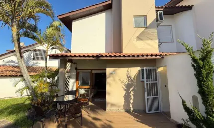 Sobrado 02 dorm à venda no bairro capão novo com 75 m² de área privativa - 2 vagas de garagem