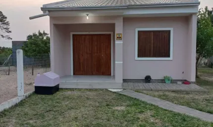 Casa 02 Dorm à venda no Bairro CAPÃO NOVO - 1 vaga de garagem