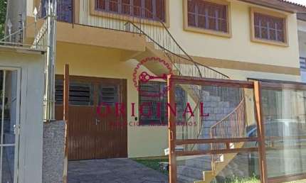 Casa com 3 quartos à venda na Rua Vico Parolini Thompson, 586, Cristo Redentor, Caxias do Sul por R$ 980.000