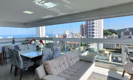 Apartamento com 3 suítes  decorado com vista mar à venda na praia da Enseada