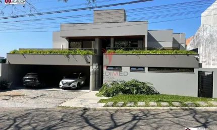 LINDA CASA EM CONDOMÍNIO FECHADO SAO JOSE FLORIPA SC COM 5 QUARTOS E 6 BANHEIROS À VENDA