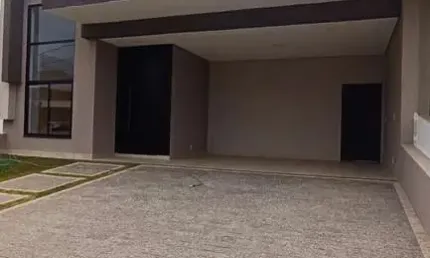 Casa com 3 dormitórios à venda, 147 m² por R$ 1.170.000,00 - Condomínio Campos d