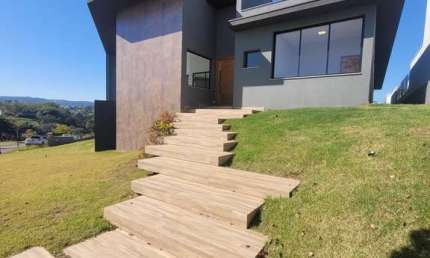 Casa com 3 dormitórios à venda, 302 m² por R$ 2.990.000,00 - Condomínio Campos d