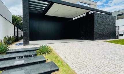 Sobrado com 3 dormitórios à venda, 326 m² por R$ 2.790.000,00 - Condomínio Alpha