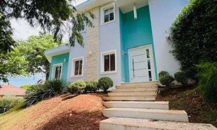 Sobrado com 4 dormitórios à venda, 463 m² por R$ 2.800.000,00 - Condomínio Campo