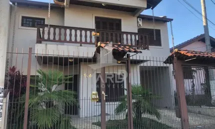 Casa com 3 quartos à venda na Rua Juvenil Pereira Fraga, 104, Cavalhada, Porto Alegre por R$ 900.000