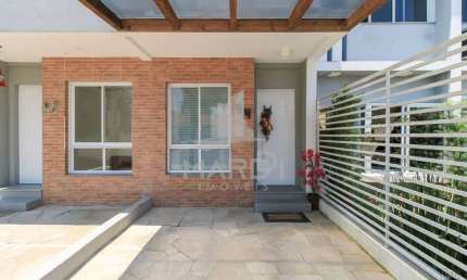 Casa com 2 quartos à venda na Rua Vacaria, 44, Hípica, Porto Alegre por R$ 450.000