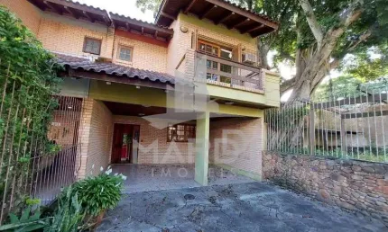 Casa com 3 quartos à venda na Rua José Kanan Aranha, 277, Jardim Isabel, Porto Alegre por R$ 795.000