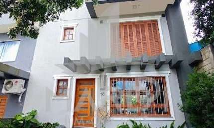 Casa em condomínio fechado com 4 quartos à venda na Rua João do Couto, 201, Belém Velho, Porto Alegre por R$ 710.000