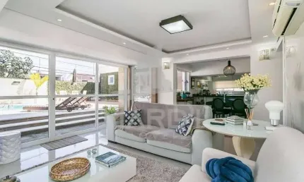 Casa com 3 quartos à venda na Rua Jacundá, 273, Guarujá, Porto Alegre por R$ 1.100.000
