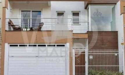 Casa com 3 quartos à venda na Rua Heitor Manganelli, 300, Jardim Itu Sabará, Porto Alegre por R$ 750.000