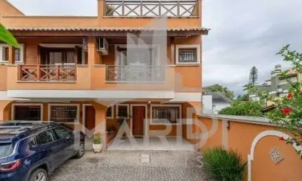 Casa em condomínio fechado com 3 quartos à venda na Rua General Rondon, 165, Tristeza, Porto Alegre por R$ 1.180.000