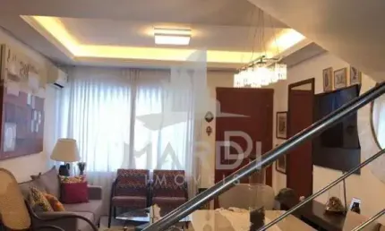 Casa com 3 quartos à venda na Rua Irmão Jaime Biazus, 73, Guarujá, Porto Alegre por R$ 530.000