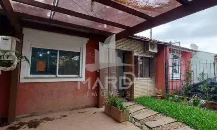 Casa com 3 quartos à venda na Avenida Nossa Senhora de Guadalupe, 330, Hípica, Porto Alegre por R$ 330.000