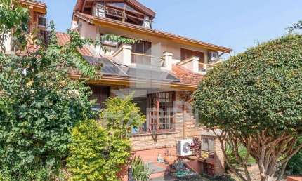 Casa em condomínio fechado com 3 quartos à venda na Avenida da Cavalhada, 6021, Cavalhada, Porto Alegre por R$ 560.000