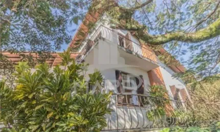 Casa com 4 quartos à venda na Rua Simão Bolívar, 302, Vila Conceição, Porto Alegre por R$ 1.390.000