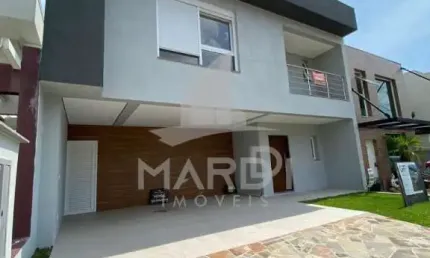 Casa em condomínio fechado com 3 quartos à venda na Rua Ivo Walter Kern, 599, Hípica, Porto Alegre por R$ 1.100.000