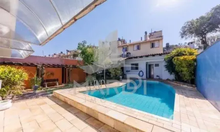 Casa com 3 quartos à venda na Avenida Arlindo Pasqualini, 72, Jardim Isabel, Porto Alegre por R$ 980.000