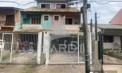 Casa com 2 quartos à venda na Rua James Bocacio, 96, Hípica, Porto Alegre por R$ 550.000