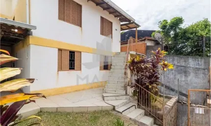 Casa com 5 quartos à venda na Rua Carlos Ribeiro da Silva, 199, Partenon, Porto Alegre por R$ 350.000