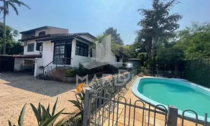 Casa em condomínio fechado com 4 quartos à venda na Rua Pedro A. A. de Freitas Filho, 186, Jardim Itu Sabará, Porto Alegre por R$ 1.500.000