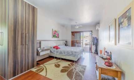 Casa com 3 quartos à venda na Rua Padre Alois Kades S J, 310, Jardim Europa, Porto Alegre por R$ 1.360.000