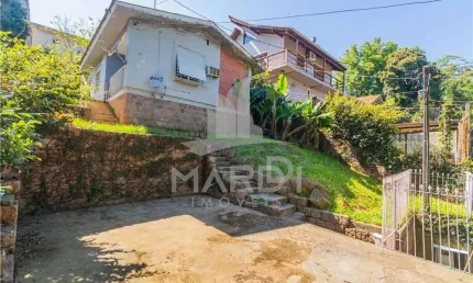 Casa em condomínio fechado com 3 quartos à venda na Acesso dos Hibiscos, 30, Santa Tereza, Porto Alegre por R$ 260.000