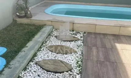 Casa com 3 quartos à venda na Rua Claudio da Silva Pinto, 484, Guarujá, Porto Alegre por R$ 660.000
