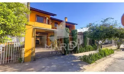 Casa com 4 quartos à venda na rua coronel jaime da costa pereira, 340, partenon, porto alegre por r$ 1.090.000