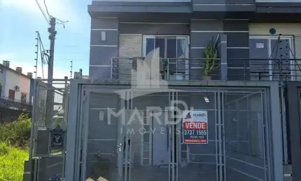 Casa com 3 quartos à venda na Rua Hilário Gonçalves Pinha, 50, Hípica, Porto Alegre por R$ 550.000
