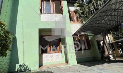 Casa em condomínio fechado com 3 quartos à venda na Avenida Juca Batista, 4115, Hípica, Porto Alegre por R$ 425.000