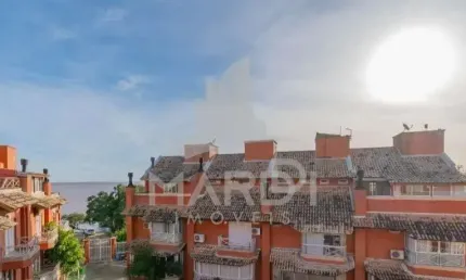 Casa em condomínio fechado com 3 quartos à venda na Avenida Guaíba, 4400, Vila Assunção, Porto Alegre por R$ 995.000