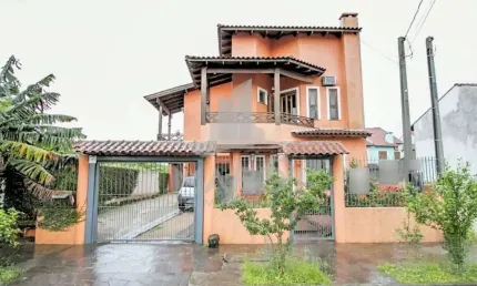 Casa com 4 quartos à venda na Rua Ocimar Antonio Pereira, 79, Hípica, Porto Alegre por R$ 590.000