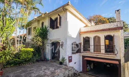 Casa com 5 quartos à venda na rua professor ivo corseuil, 129, petrópolis, porto alegre por r$ 1.350.000