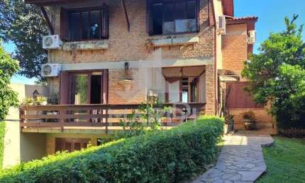 Casa com 3 quartos à venda na Rua Coroados, 1200, Vila Assunção, Porto Alegre por R$ 2.200.000